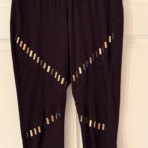 Torrid Black and Gold Leggings with Mesh Panels